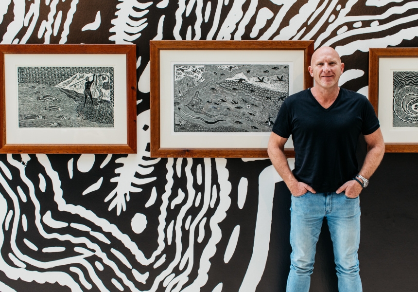 Matt Moran in the Art Gallery of NSW entrance court, featuring artworks by Badger Bates, as part of the 23rd Biennale of Sydney, rīvus. Artwork © the artist
