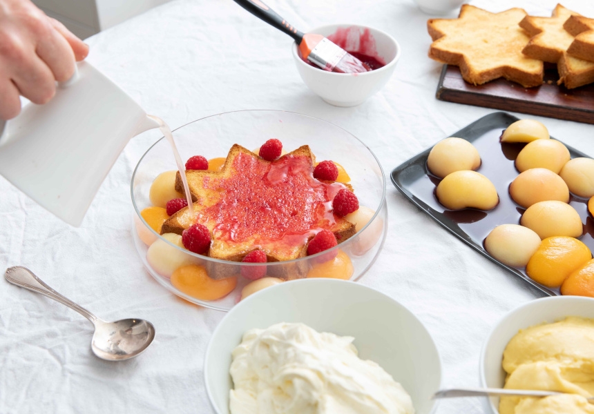 Brush the slice with raspberry jam and add whole raspberries in between the star-points of the slice. If using vin santo or sherry, drizzle over the slice.
