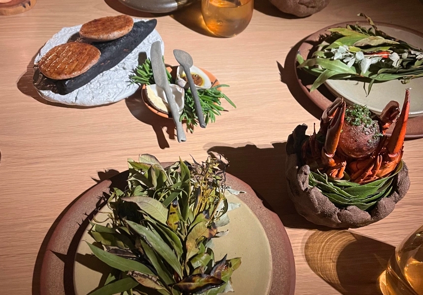 Marron cooked in botanical leaves with brown butter, lemon myrtle and fermented chilli with a marron doughnut glazed in marron coral, Restaurant Botanic
